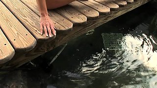 Blonde is flashing her big boobs in the outdoors