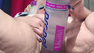 Big Bottle Plugged Clit Cunt