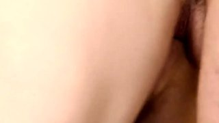 Busty babe playing with her big boobs