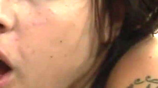 Redhead tattooed babe is licking her gf's pussy