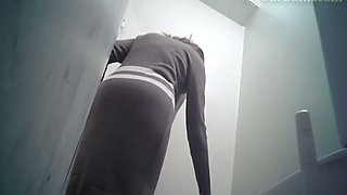 Sweet plump pale skin booty of a stranger girl in the toilet room