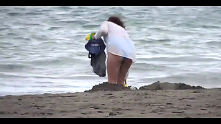 My Wife, a Beautiful 58-year-old on the Beach, Shows off and Masturbates with Hers