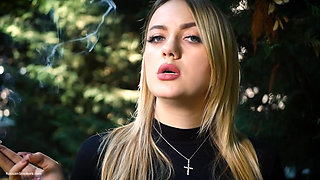 Hot Blonde Babe Smoking One Black Cigarettes in Nature