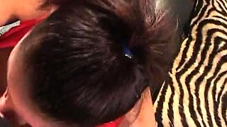 A super sexy brunette massages her big boobs