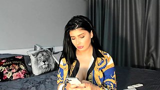 Amateur young brunette enjoys dildo on solo masturbation