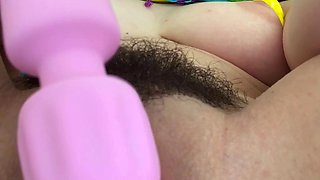 Attractive brunette teenager with big boobs fingering pussy