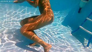 Outdoor sexy nude swimming by exhibitionist girl