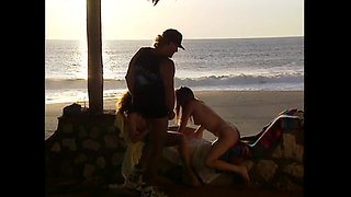 Threesome - Two Young Big Tits Friends on Vacation Share a Surfer's Big Cock on the Beach
