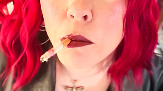 Your Mistress Tina Snua Dressed in Leather Chain Smoking 2 Cork Cigarettes