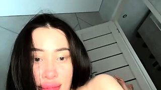 Small titted brunette teen fingering on the bed