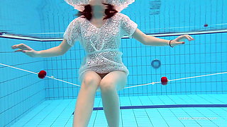 Tight brunette Russian babe Katy Soroka swims