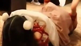 A Cute Little Dressed in a Jk Uniform Was Walking Around Barefoot on the Ground.