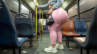 Balaclava BBW Gets Ass in Tight Shiny Pink Pants - Public Bus