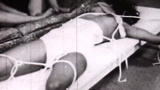 Black-and-white Vintage Bondage Classic with Rope-bound Retro Submissives