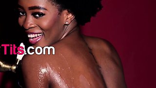 Petite ebony babe strips nude in bathtub