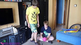 Skinny Twink in Black Socks Inflates Balloons with Footjob
