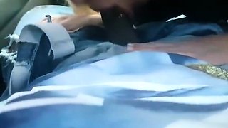 AMATEUR BLONDE SUCKING A BIG BLACK COCK IN A CAR