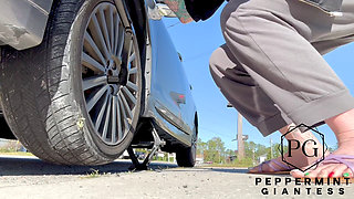 67 Tall Amazon Goddess Changes Her Tire - Big Feet in Frame