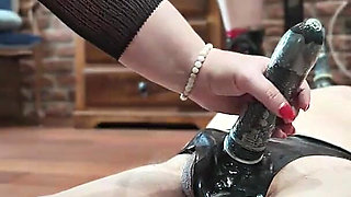 Two Busty Dominatrixes Use a Sex Slave for a Joint Fuck.
