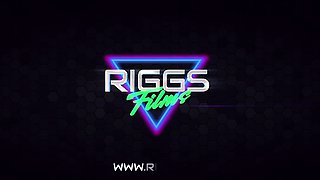 In a kitchen a sexy brunette playing with her big boobs