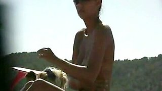 Big tits on the beach in this beach cam video compilation