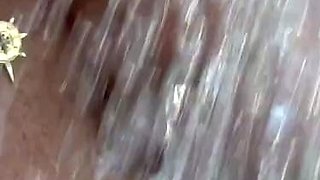 Busty curly brunette with big boobs fucks on couch