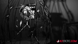 Darenzia Teases in a Black Latex Corset - AltErotic