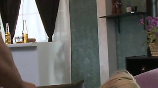 Sexy mature Diamond breaks out her awesome big tits and fucks a younger man on the couch