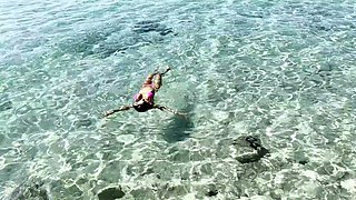 Bodacious bikini model showing off perfect curves outdoors