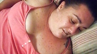 Busty wife gives her husband a handjob