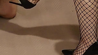 Ballbusting in fishnet stockings