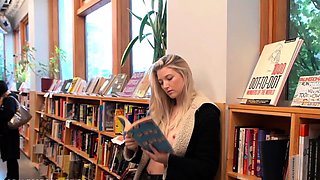 Sensuous blonde teen flashing her perky tits in public