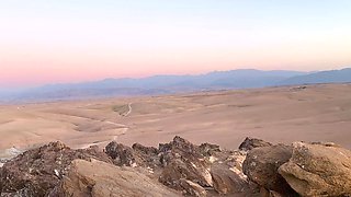 Busty curly brunette with big boobs fucks on couch