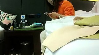 Cute amateur asian web cam girl playing with her toy