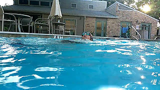 Couple Underwater Diving and Swimming