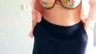 Turkish Arab in Hijab and Turban Performs a Striptease