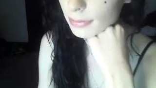 Brunette enjoys the toy on gaping pussy while masturbating
