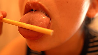 I’m Sucking and Licking a Popsicle, Playing with It Using My Lips and Mouth.