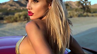 Big boobs gorgeous MILF strips outdoors