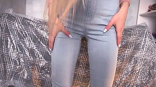 Blonde in tight jeans wets herself in black pantyhose, soaking her shoes in pee