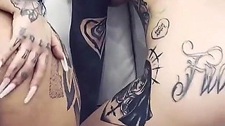 Tattooed MILFs Share Lucky Stud in Christmas Threesome