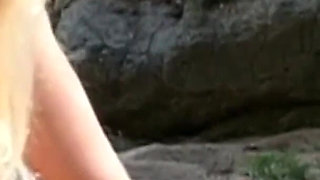 Horny couple fucking on the end of a beach