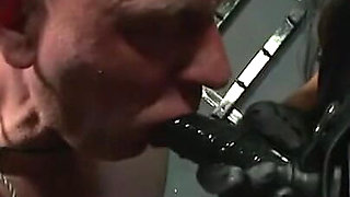 Humiliating dildo sucking