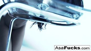 Amazing Asa plays with her pussy