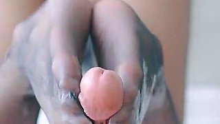 Beauty in Stockings Gives Blowjob and Footjob Till He Cums!