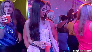 Handsome, black guy is getting a handjob from a random chick, in the night club