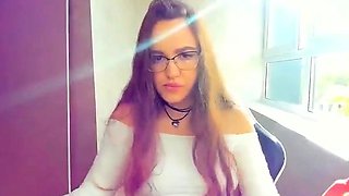 Russian brunette busty camgirl masturbating on webcam