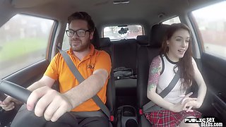 Red-haired learner driver fucks her driving instructor in the car